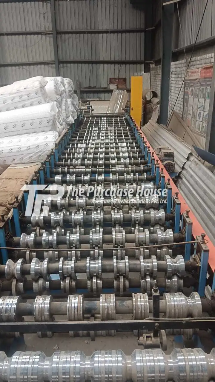 Automatic roll forming machine for metal sheet forming