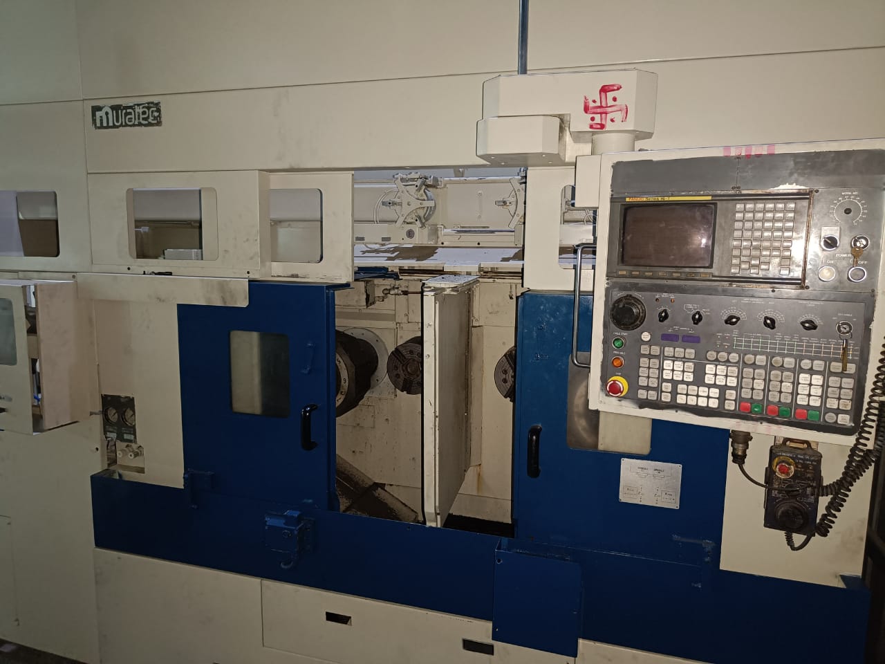 TWIN SPINDLE CNC TURNING MACHINE