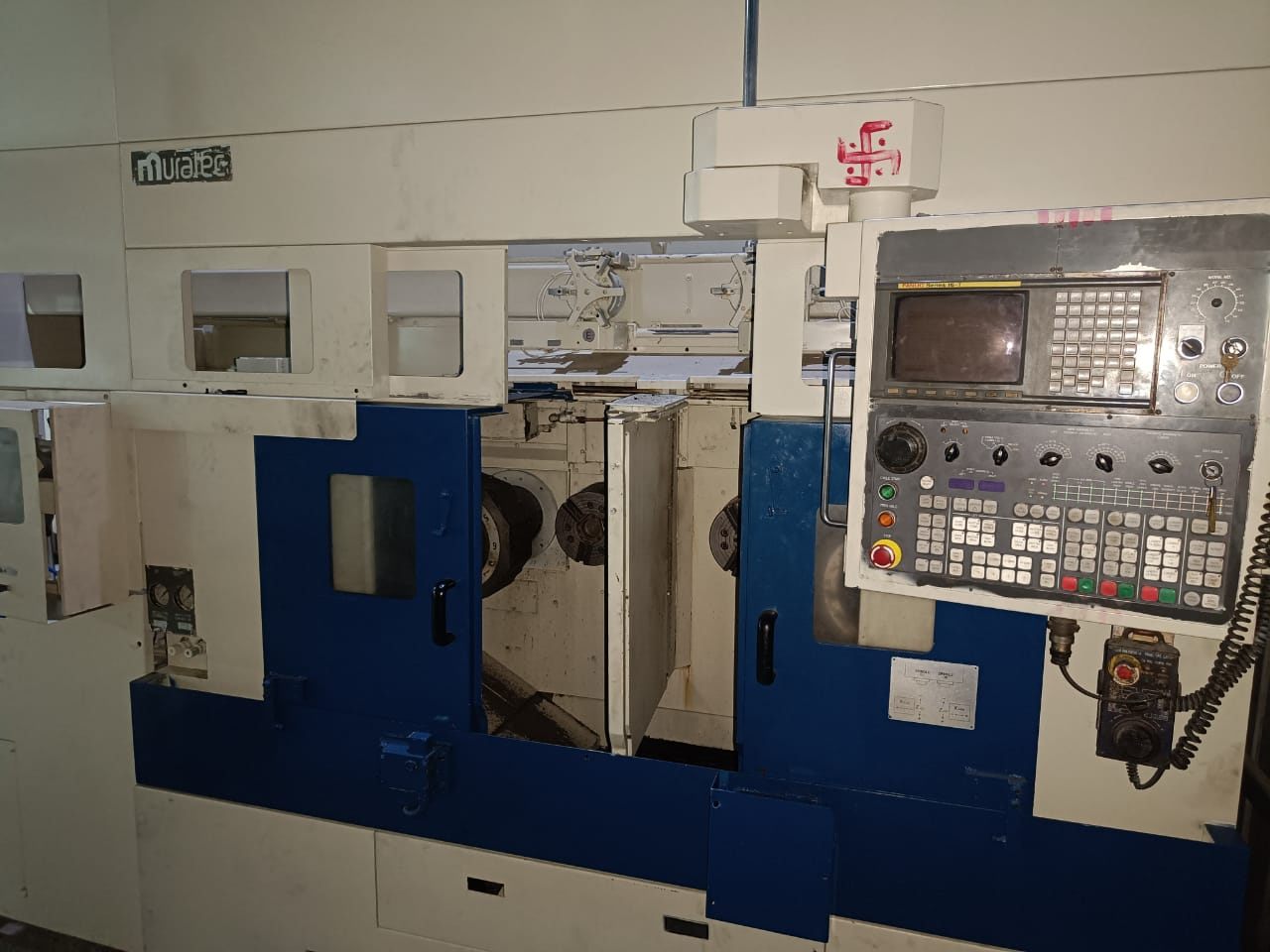 TWIN SPINDLE CNC TURNING MACHINE