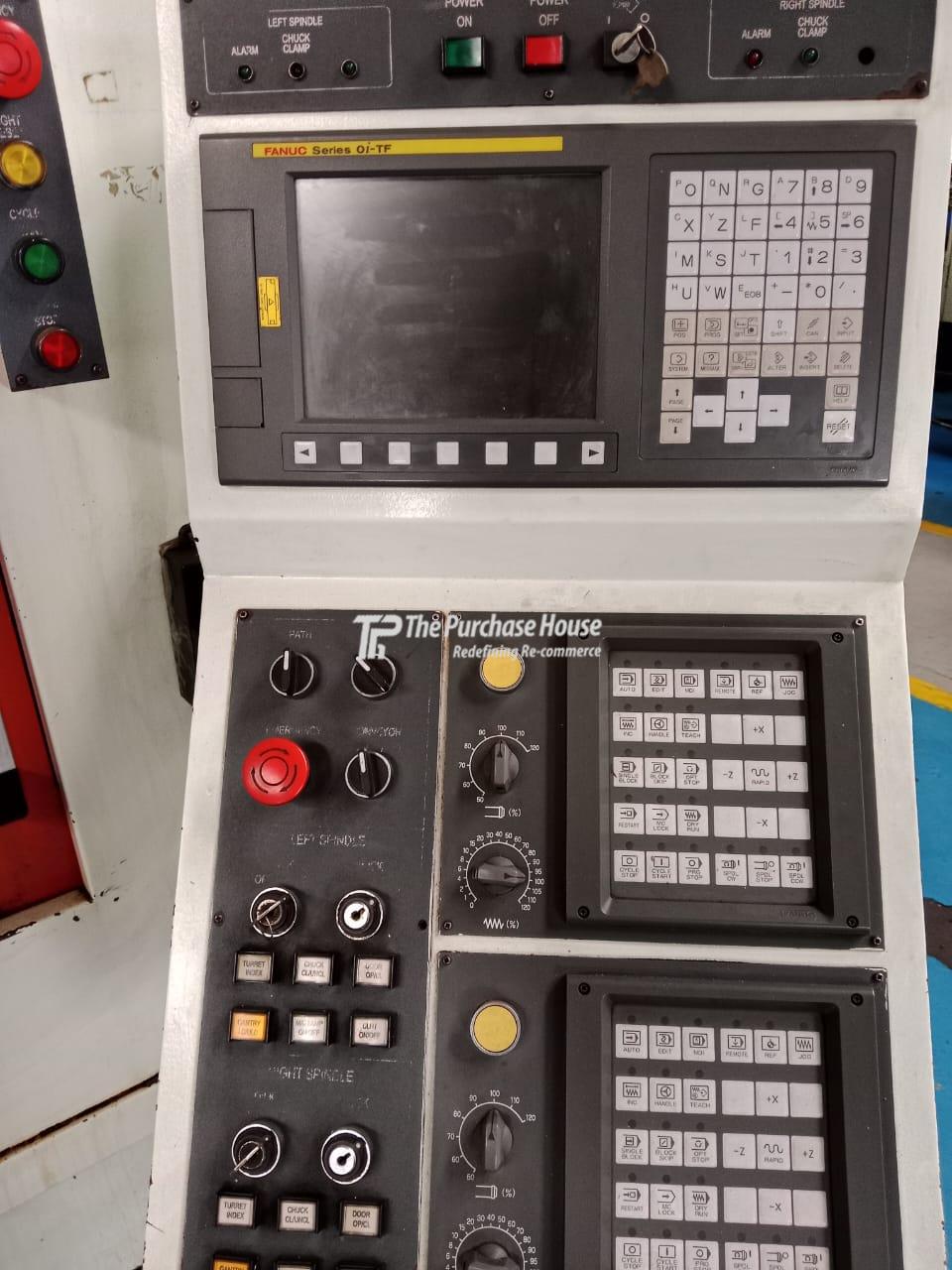 TWIN SPINDLE CNC TURNING MACHINE