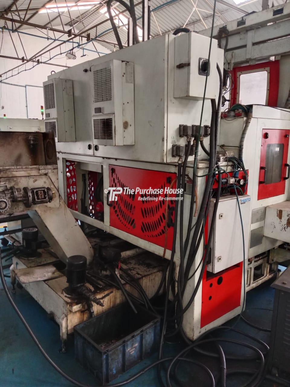 TWIN SPINDLE CNC TURNING MACHINE
