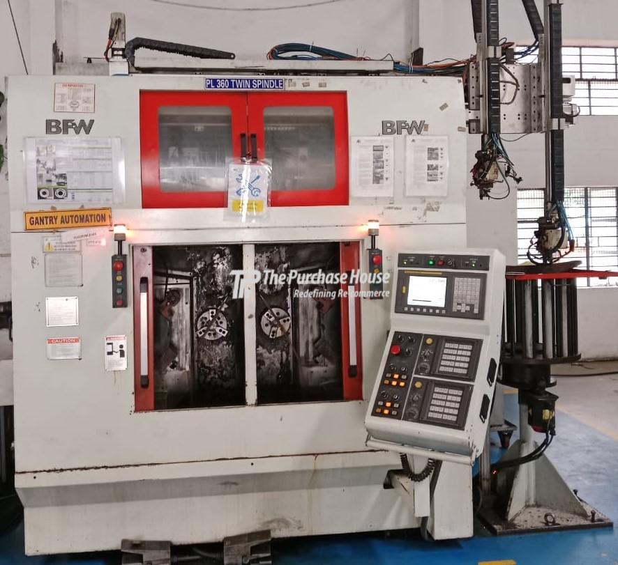 TWIN SPINDLE CNC TURNING MACHINE