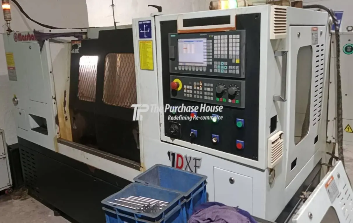 TWIN SPINDLE CNC TURNING MACHINE