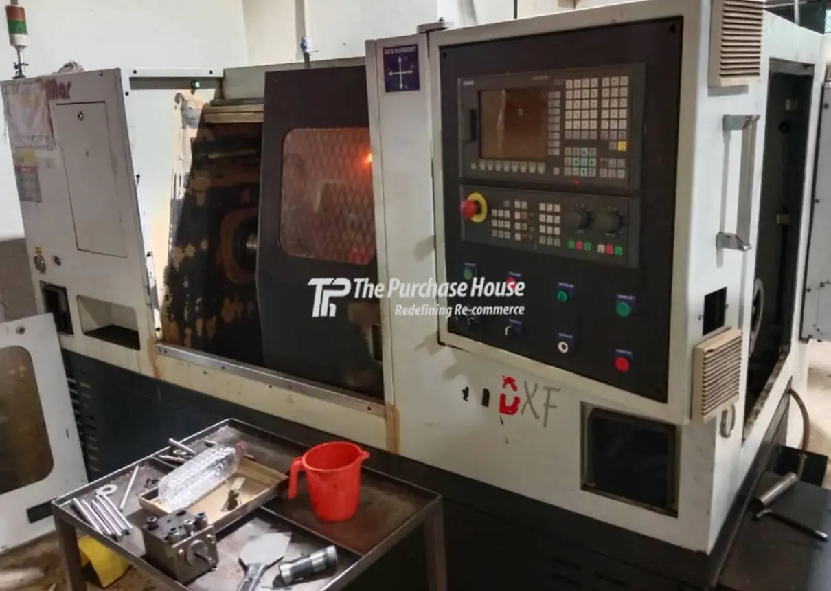TWIN SPINDLE CNC TURNING MACHINE