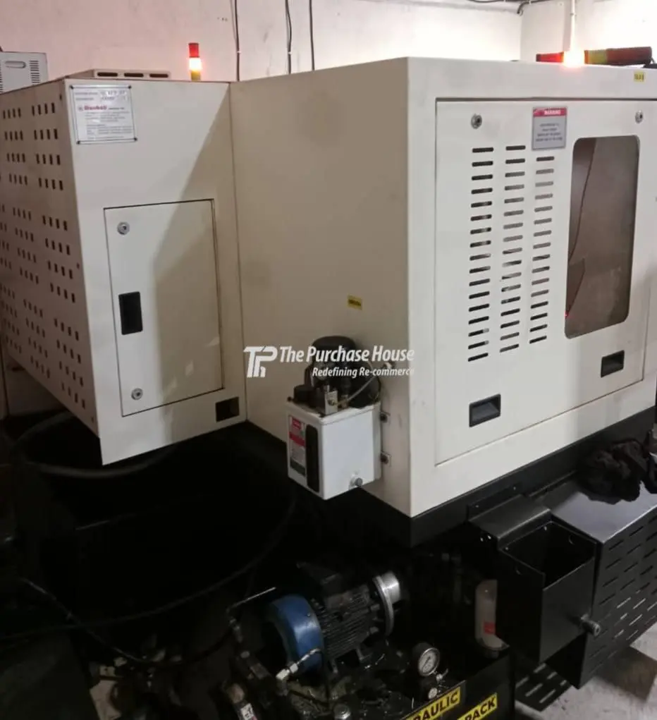TWIN SPINDLE CNC TURNING MACHINE