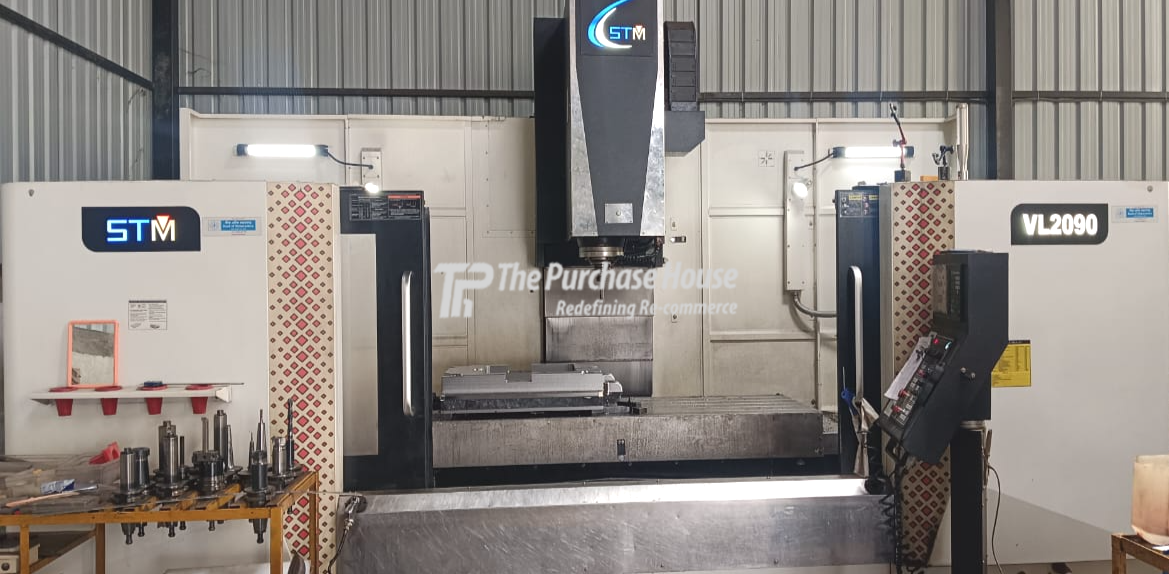 VMC MACHINING SETUP WITH AUXILIARY SUPPORT SYSTEMS